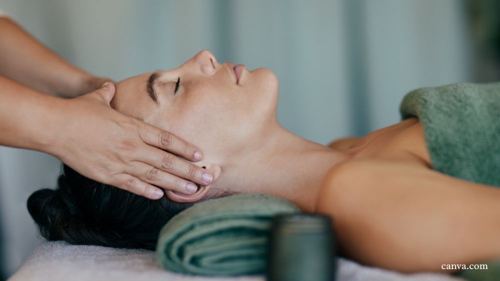 woman lying on massage table on her back getting massage